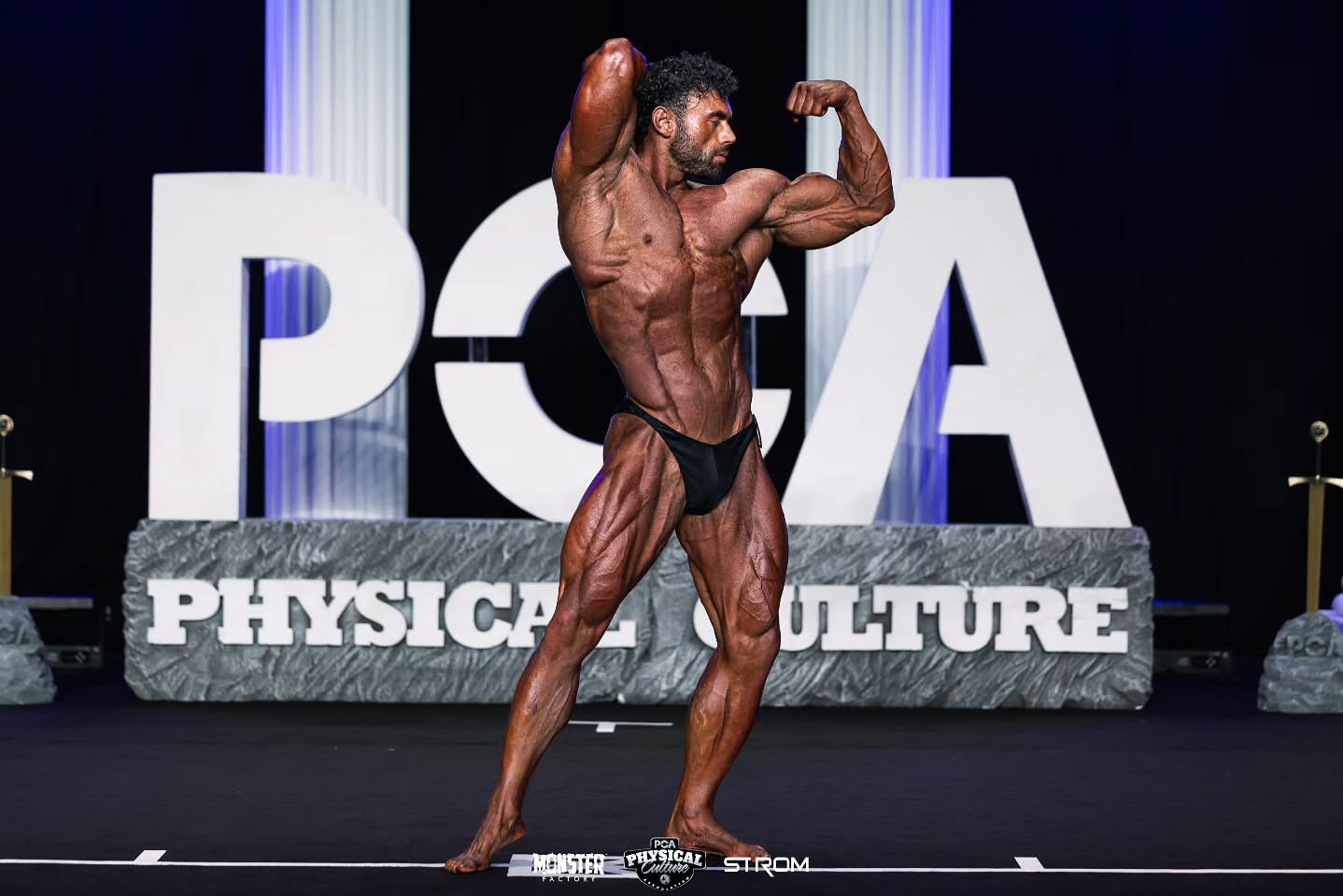 Mark Flack PCA Stage Side Pose
