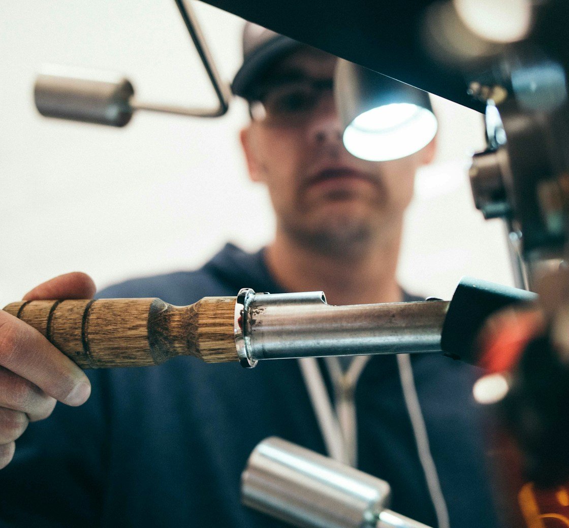 Engineer neatly completing copper heating pipework installation